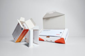 Faltschachtel und Packungsbeilage als Einheit